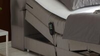Boxspringbett Carpino Stoff silber Komfortbett mit Motor 120x200 cm