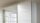 Schwebetürenschrank QUADRA in weiß mit Spiegel 315x210